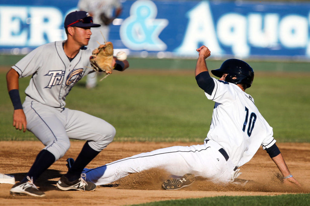 Everett’s Evan White is safe on a play at second base during the AquaSox’s 13-3 win over Tri-City Wednesday at Everett Memorial Stadium. (Kevin Clark / The Herald)
