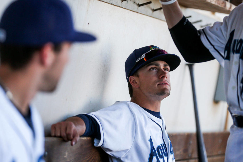 AquaSox first baseman Evan White listens in the dugout before a game against the Canadians on June 27, 2017, at Everett Memorial Stadium in Everett. (Kevin Clark / The Herald)
