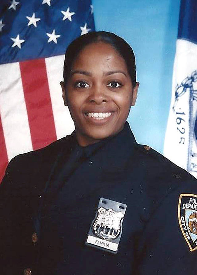 This undated photoshows officer Miosotis Familia, who was shot to death early Wednesday, ambushed inside a command post RV by an ex-convict, authorities said. The gunman was killed by police about a block away. (NYPD via AP)
