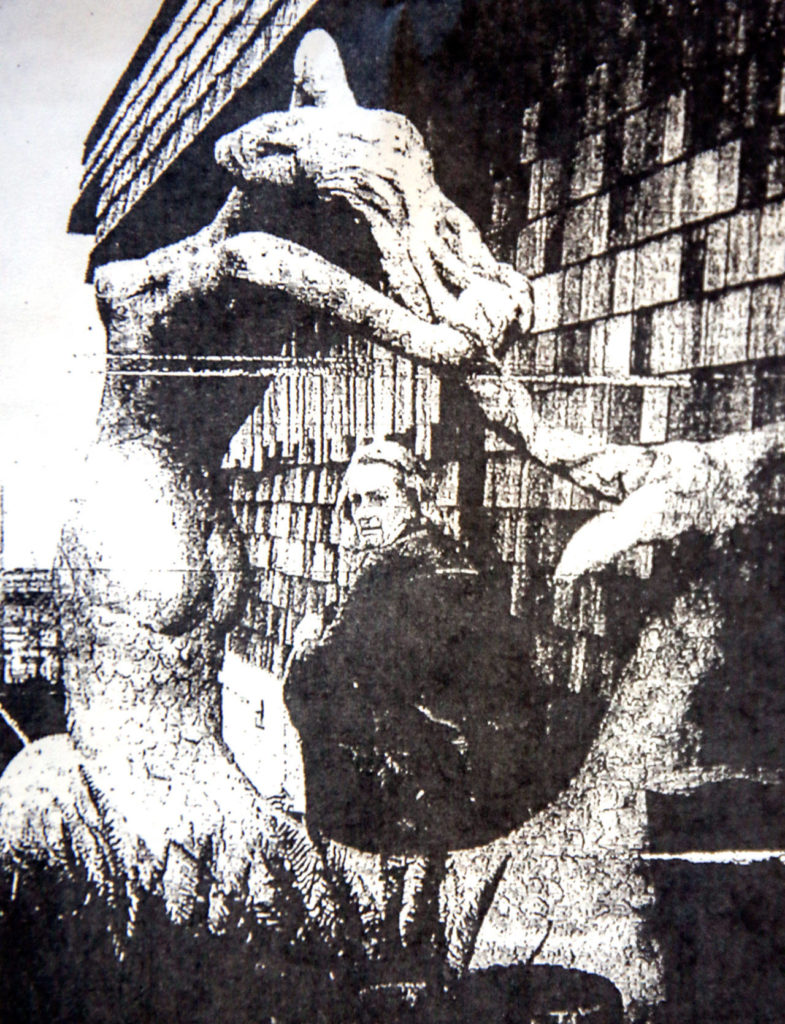 Kay Henkel, now 91, in a 1974 newspaper photo with the concrete mermaid she made in Mukilteo.
