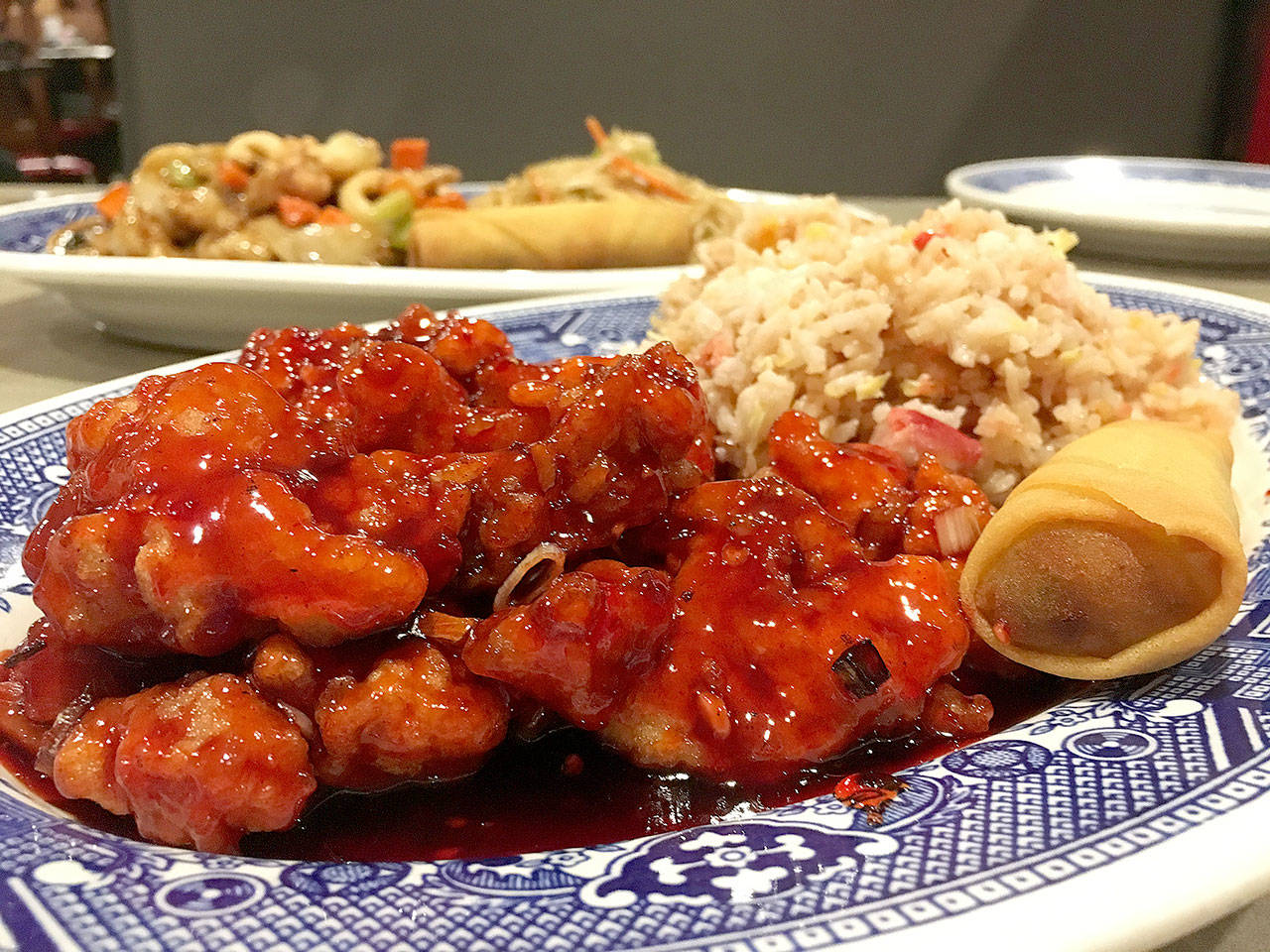 A $7.95 lunch special at Tang Wong in Everett that includes General Tao’s chicken, a fried egg roll, pork fried rice and a cup of egg flower soup. The common offerings landed well, with the chicken balanced between sweet and spicy. (Ben Watanabe / The Herald)