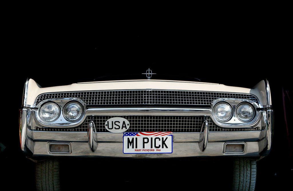 A 1961 Lincoln Continental, seen here peeking from a Lake Stevens garage, was once owned by actress Mary Pickford. It has been purchased by Vicki and Ron Selia. They had it shipped here from New Zealand. (Dan Bates / The Herald)
