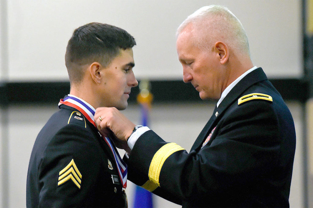 Army Brig. Gen. Jon A. Jensen (right), commanding general of the 34th Infantry Division, awards Army Sgt. Grant Reimers, a heavy vehicle operator with the Nevada Army National Guard’s 1859th Transportation Company, top honors in the soldier category of the 2017 Army National Guard Best Warrior Competition. Reimers beat out six other soldiers from throughout the Army Guard to be named the Army Guard’s Soldier of the Year and will move on to compete in the Department of the Army Best Warrior Competition this fall, battling it out with soldiers from throughout the Army to be named the Army’s Soldier of the Year. (U.S. Army photo by Sgt. 1st Class Jon Soucy)
