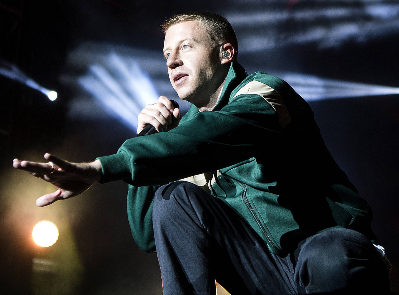 Ben Haggerty (aka Macklemore) performs in Nyon, Switzerland, Friday, on July 21. (Anthony Anex/Keystone via AP)