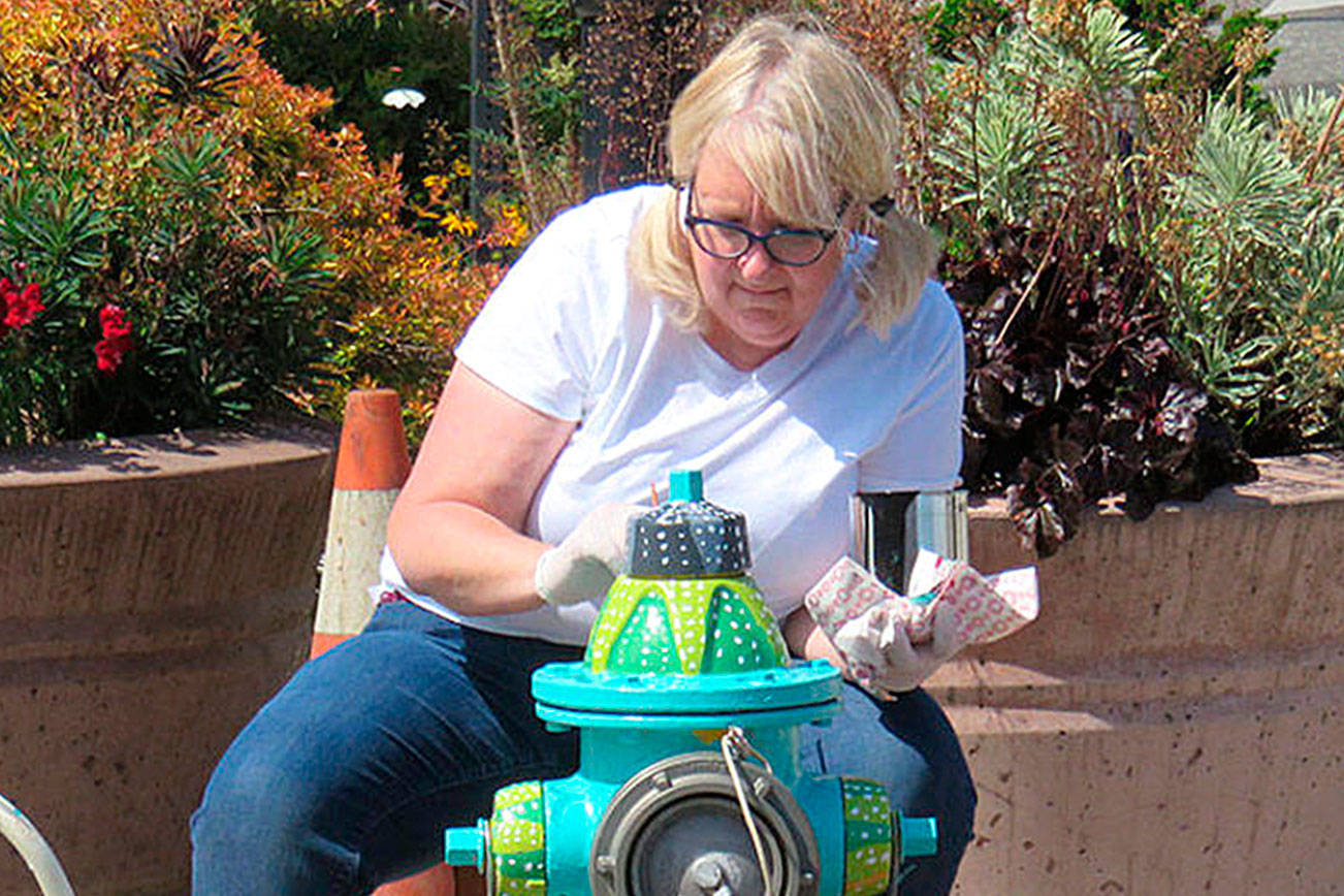 Painted fire hydrant is artist’s going-away gift to Oak Harbor