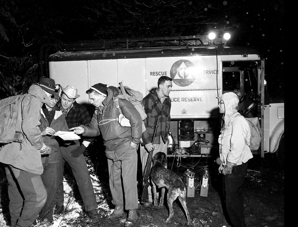 A predecessor of the Search and Rescue team prepares to search for a missing boy in the Lake Bosworth area in 1959. (Photo by Jim Leo, Herald photographer) 
