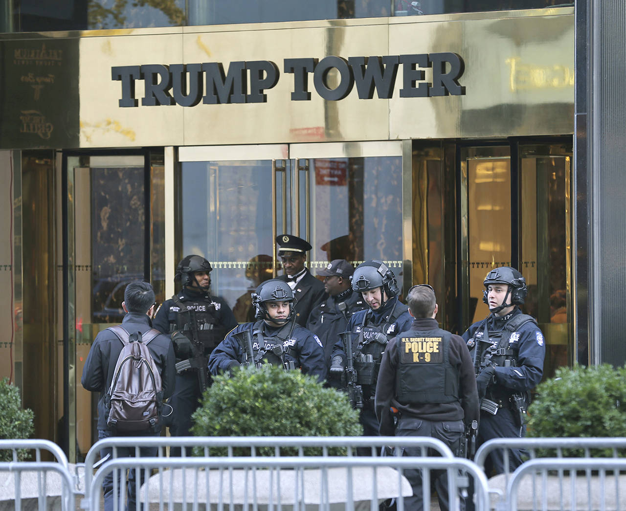 In this 2016 photo, security personnel stand at the front entrance of Trump Tower in New York. (AP Photo/Seth Wenig, File)
