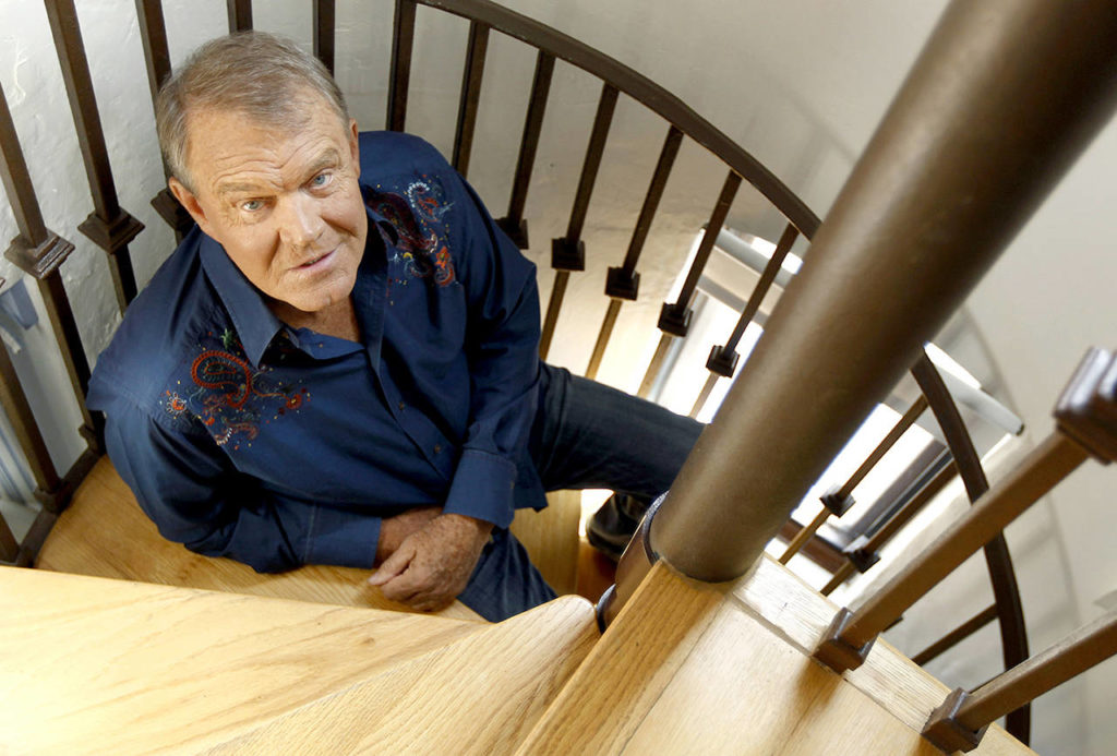 In this 2011 photo, musician Glen Campbell poses for a portrait in Malibu, California. (AP Photo/Matt Sayles, File)
