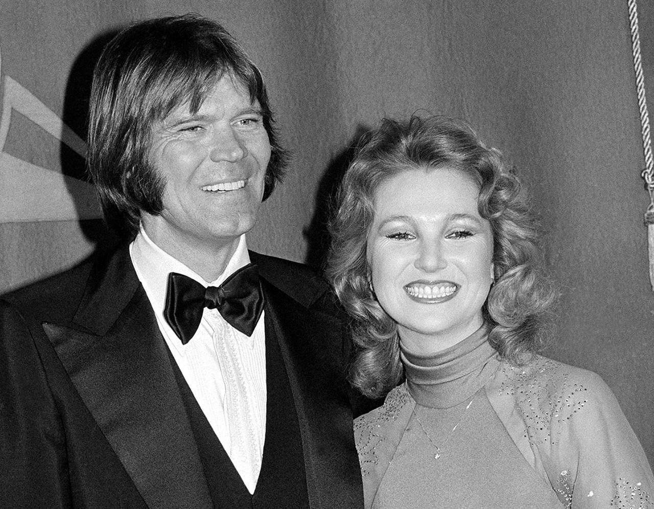 In this 1979 photo, country singers Glen Campbell and Tanya Tucker, engaged to one another, are shown at the Grammy Awards in Los Angeles. (AP Photo, File)