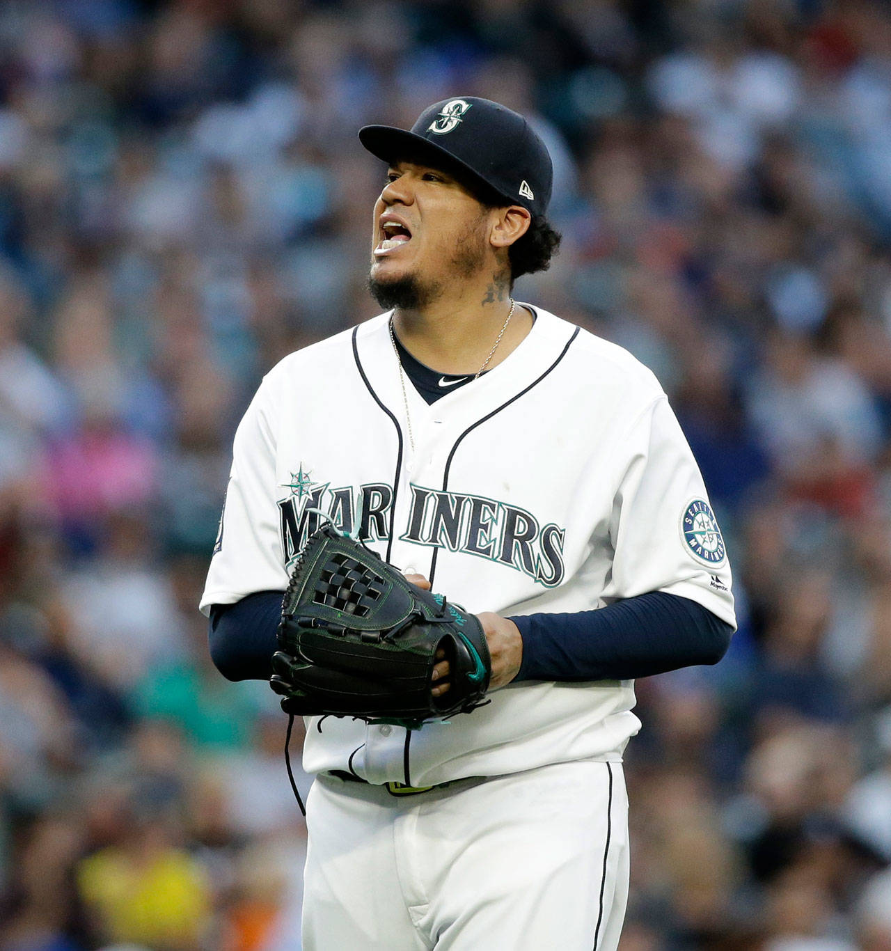 Mariners starting pitcher Felix Hernandez heads to the dugout between innings during a game against the Yankees on July 20, 2017, in Seattle. (AP Photo/Elaine Thompson)