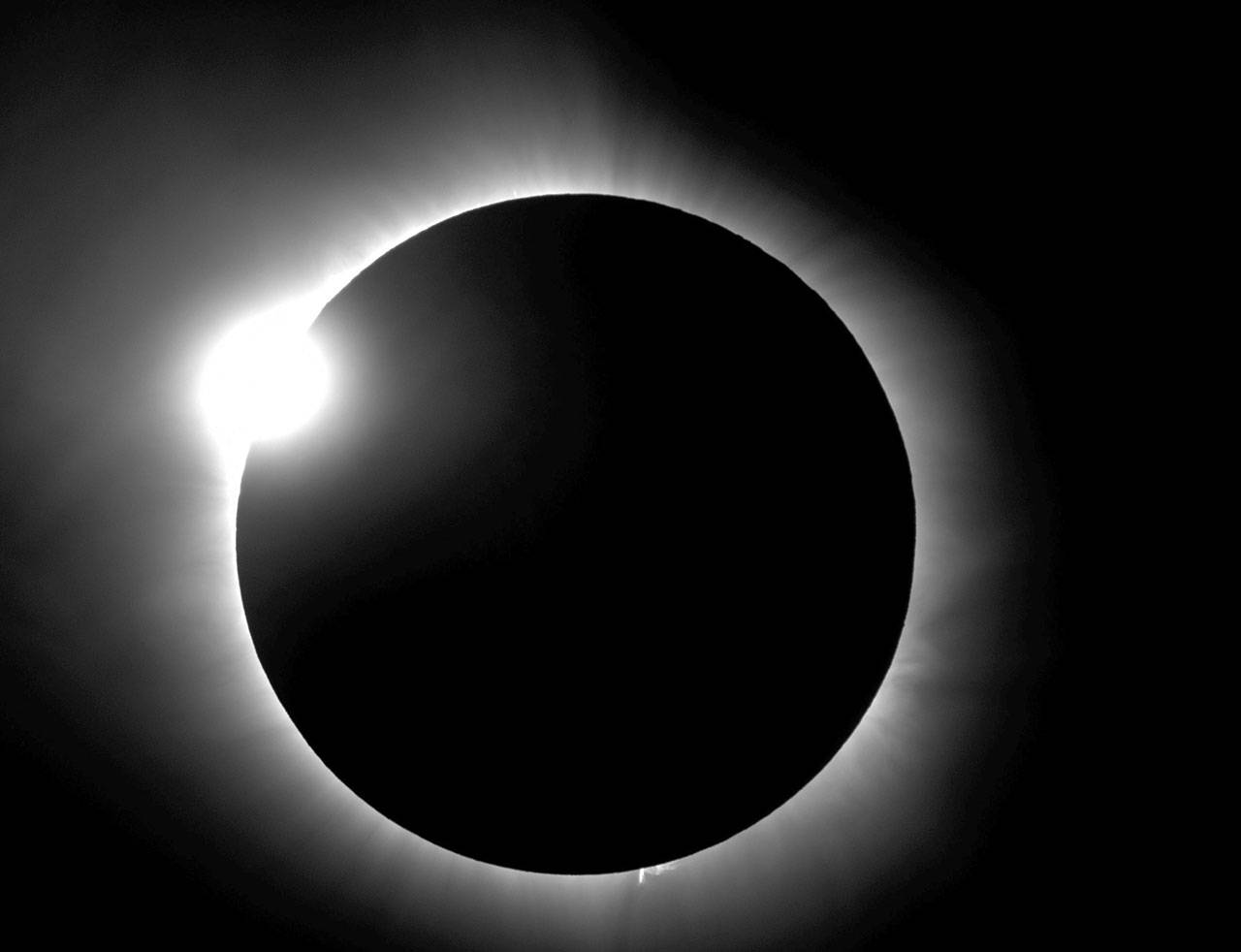 This photo provided by Bob Baer and Sarah Kovac, participants in the Citizen CATE Experiment, shows a “diamond ring” corona during the 2016 total solar eclipse in Indonesia. For the 2017 eclipse over the United States, the National Science Foundation-funded movie project nicknamed Citizen CATE will have more than 200 volunteers trained and given special small telescopes and tripods to observe the sun at 68 locations in the exact same way. The thousands of images from the citizen-scientists will be combined for a movie of the usually hard-to-see sun’s edge. (Citizen CATE Experiment via AP)