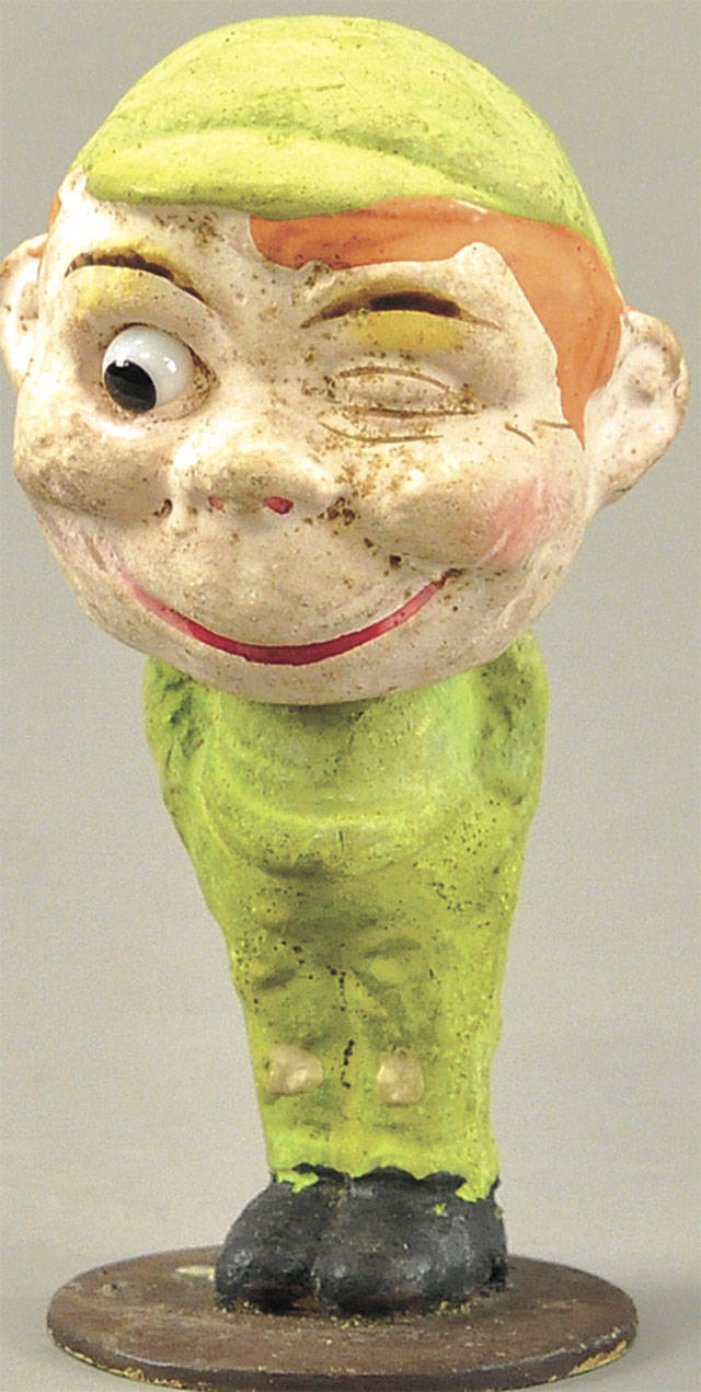 There are many collectors of Christmas and Halloween collectibles, but few celebrate St Patrick’s Day with a collection of figures. This smiling leprechaun nods his head as he learns that he was bought for $59 at a Bertoia auction in New Jersey. (Cowles Syndicate Inc.)
