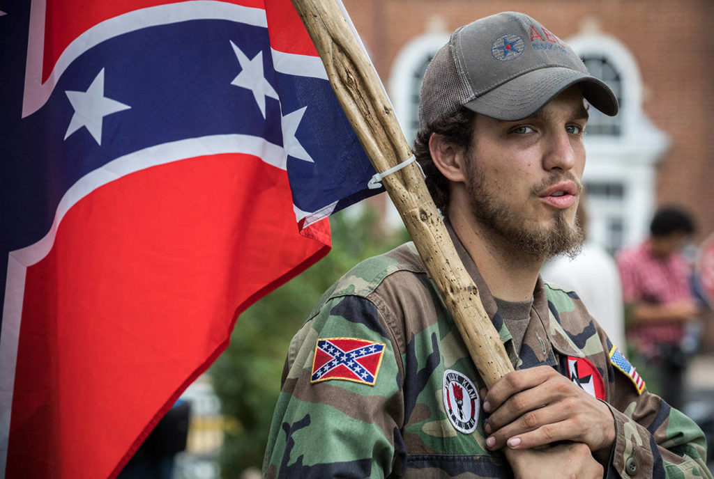 Ben, a 21-year-old KKK member from Harrison, Arkansas, attends the rally at Emancipation Park. (Evelyn Hockstein / The Washington Post)
