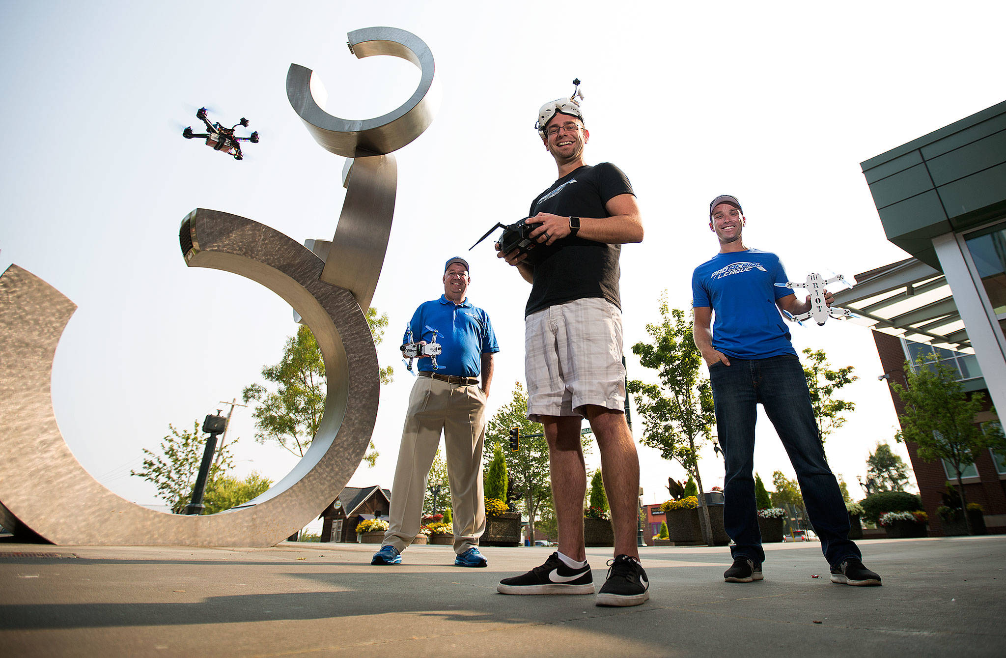 Pro Aerial League founder Brian Deller (right) with Scott Whiteker (left) and Ken Allison at Xfinity Arena on Aug. 9 in Everett. (Andy Bronson / The Herald)
