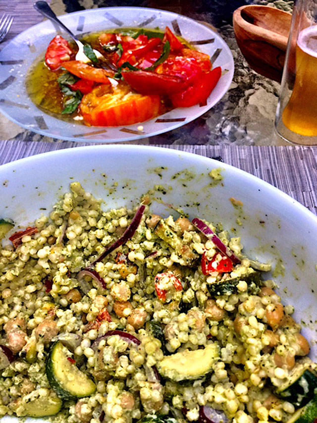 The larger grains of Israeli couscous combined with chickpeas, grilled vegetables and vibrant Green Goddess dressing come together in an excellent salad for late summer. (Kathleen Purvis/Charlotte Observer)