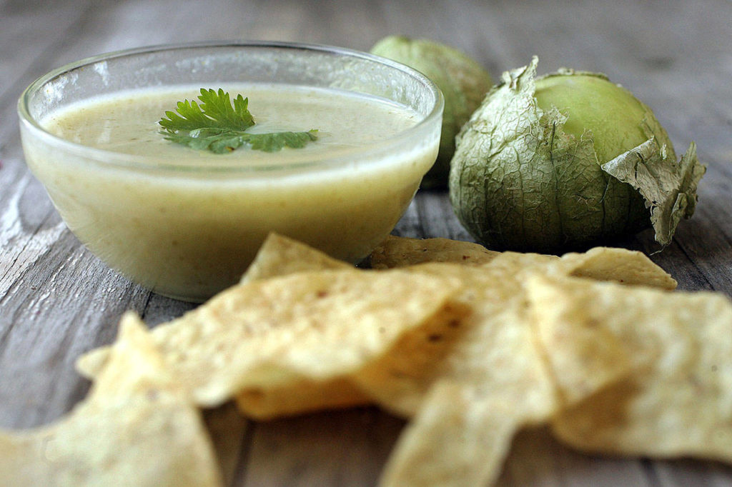 Green salsa, salsa verde, can be served either cooked or raw. (Hillary Levin/St. Louis Post-Dispatch/TNS)
