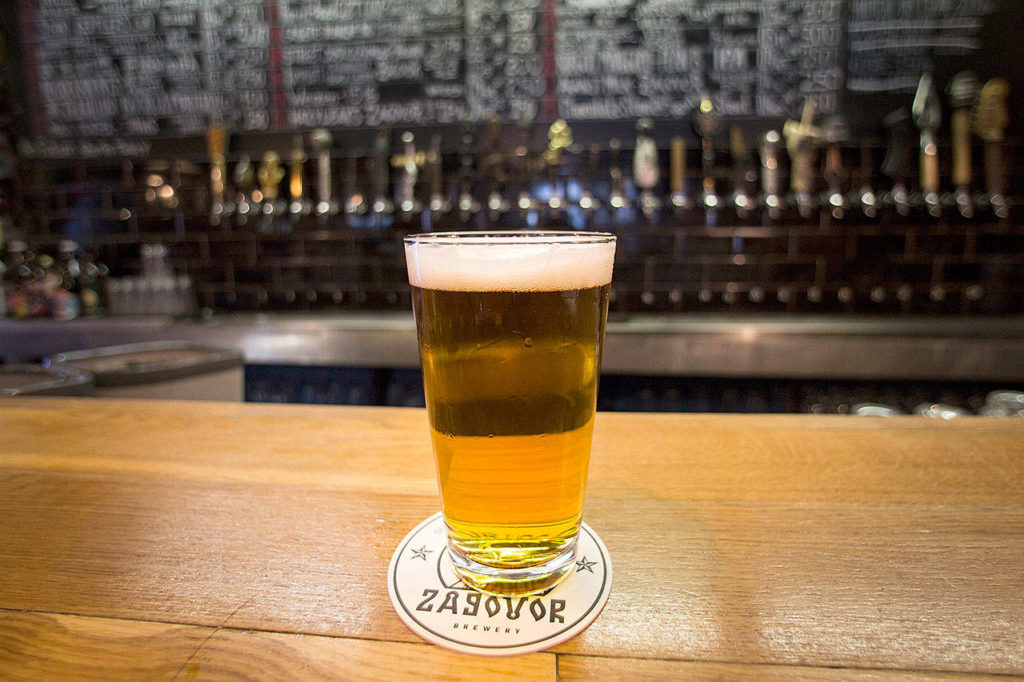 A glass of craft beer sits on the bar at the Rule Taproom pub in Moscow. (AP Photo/Alexander Zemlianichenko)
