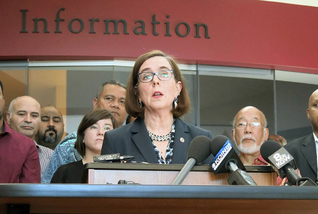 In this May 27 photo, Oregon Gov. Kate Brown speaks at a news conference in Portland, Oregon. (AP Photo/Gillian Flaccus, File)