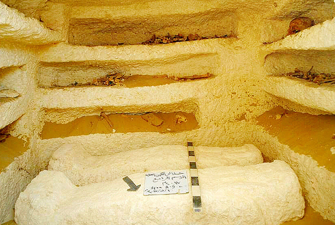 Sarcophagi in a Ptolemaic tomb in an area known as al-Kamin al-Sahraw, in the Nile Valley province of Minya, south of Cairo. Egypt’s antiquities ministry says that archaeologists have discovered three tombs dating back more than 2,000 years, from the Ptolemaic Period. (Egyptian Ministry of Antiquities via AP)