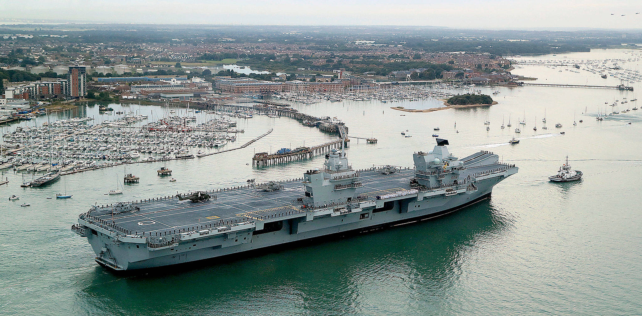 Britain’s new flagship, HMS Queen Elizabeth, arrives in Portsmouth, Britain, on Wednesday. (Gareth Fuller/PA via AP)