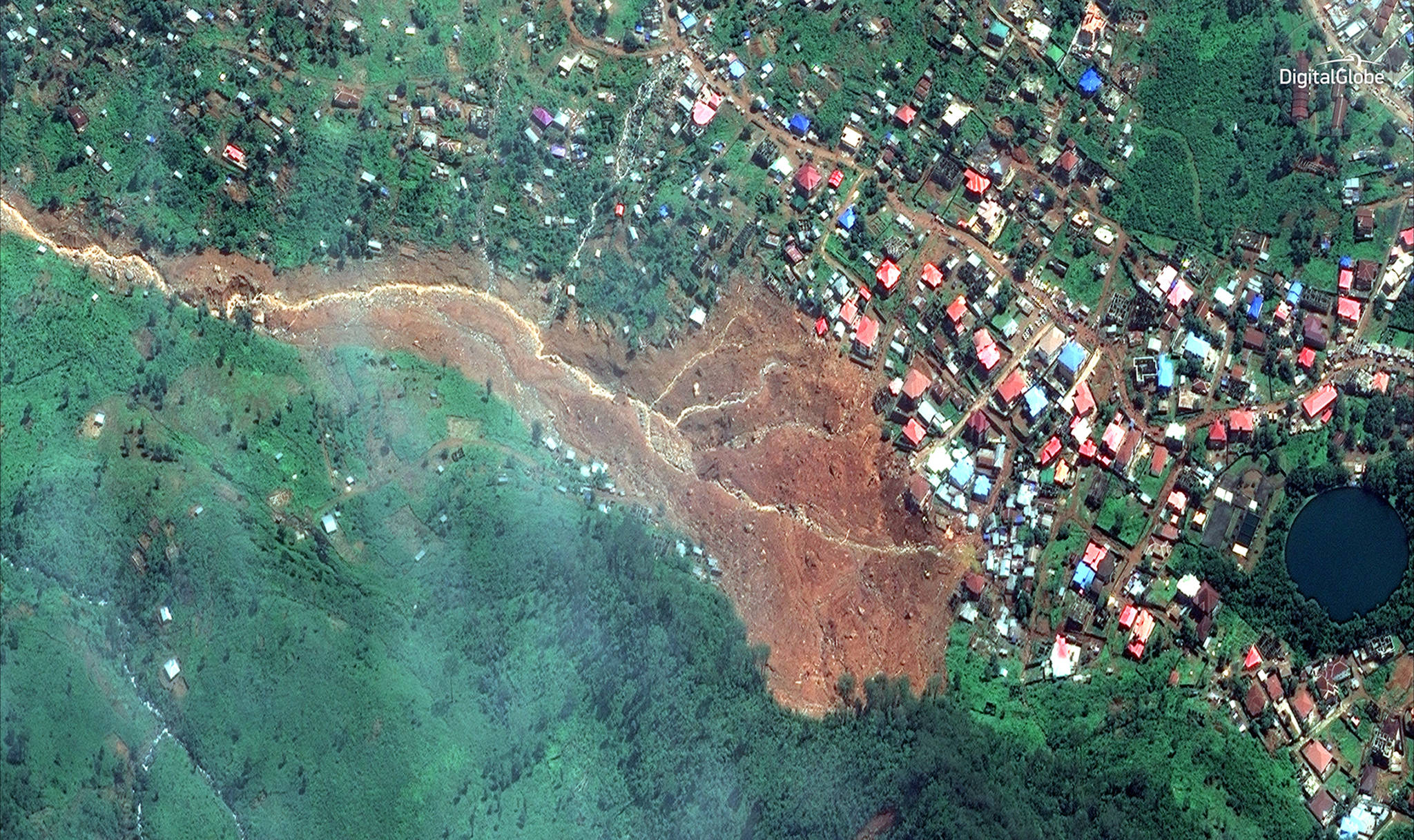 This is a satellite image taken Tuesday of the mudslide in Freetown, Sierra Leone. (DigitalGlobe via AP)