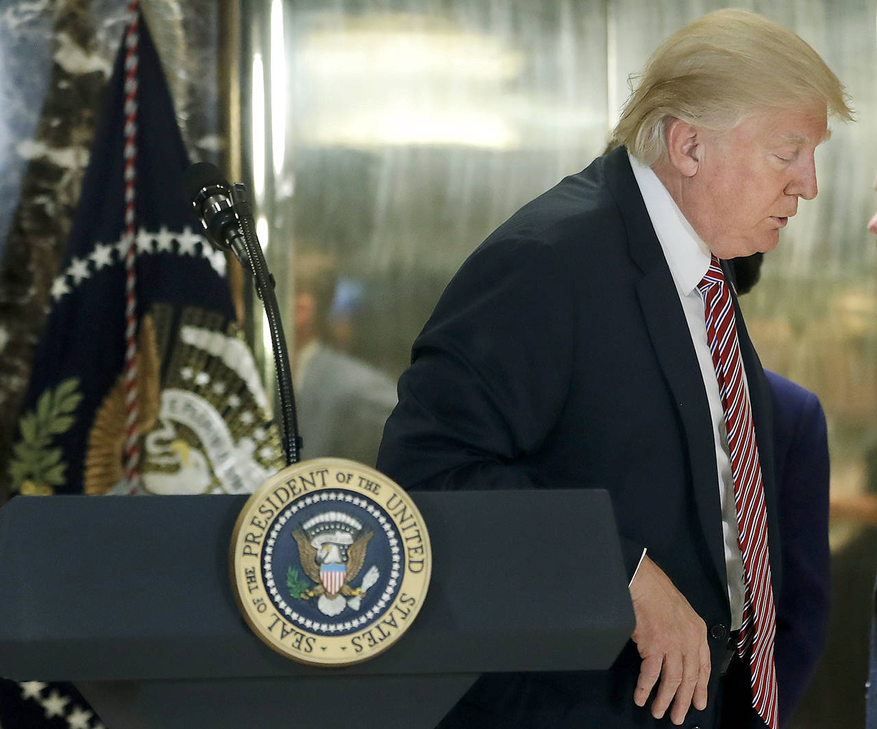 President Donald Trump walks away from his podium after speaking in the lobby of Trump Tower on Tuesday in New York. (AP Photo/Pablo Martinez Monsivais)
