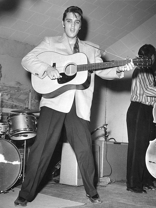 Elvis Presley plays guitar during a concert in Fort Worth, Texas, early in his career. (Fort Worth Star-Telegram/File photo)