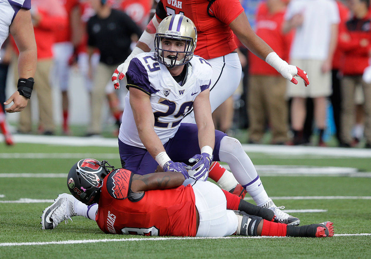 Washington linebacker Connor O’Brien (29) looks on after tackling Utah quarterback Troy Williams (3) in the first half of a game Oct. 29, 2016, in Salt Lake City. (AP Photo/Rick Bowmer)