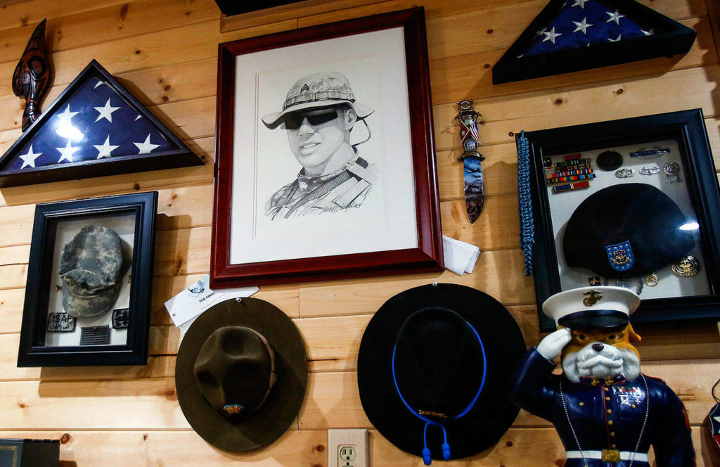 Jim Mathis’ son, National Guard Staff Sgt. Mark Mathis, is memorialized on a wall in the couple’s home. He died by suicide in 2010, several years after returning from service in Afghanistan. “My son came back from Afghanistan, but didn’t quite make it home,” Jim Mathis said. (Dan Bates / The Herald)
