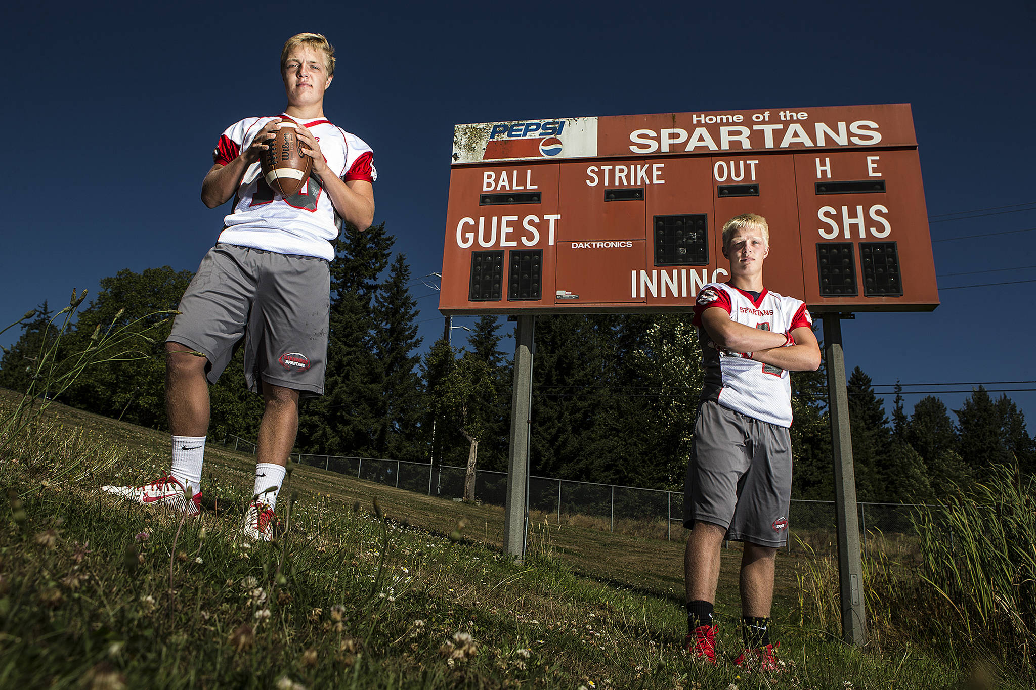 Brothers Karl (left) and Trygve DeBoer have become an integral part of Stanwood’s offense at the quarterback and wide receiver positions. (Ian Terry / The Herald)