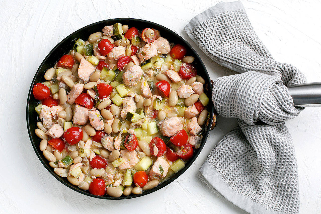 Lemon-tarragon salmon and white bean skillet is a one-pan dish that is nearly effortless to prepare, made with everyday ingredients that come together in just minutes. (Photo by Deb Lindsey for The Washington Post)