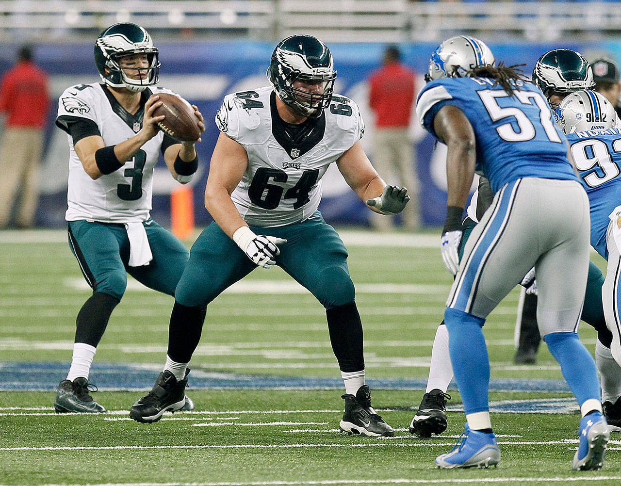 Philadelphia’s Matt Tobin (64) blocks for quarterback Mark Sanchez (3) in a Thanksgiving Day game in Detroit on Nov. 26, 2015. The Seahawks acquired Tobin and a 7th-round pick from the Eagles on Monday for a 5th-round selection. (AP Photo/Duane Burleson)