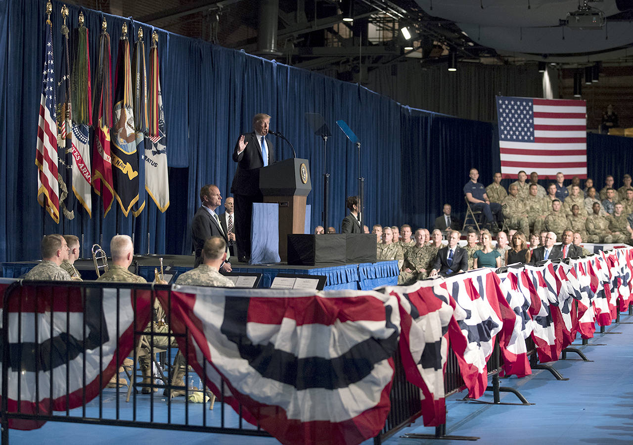 President Donald Trump speaks at Fort Myer in Arlington, Virginia, on Monday during a Presidential Address to the Nation about a strategy he believes will best position the U.S. to eventually declare victory in Afghanistan. (AP Photo/Carolyn Kaster)