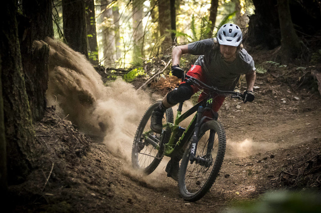 Skye Schillhammer flies through a corner on Darrington’s new North Mountain trail network. With trails suitable for all ages and skill levels, and new higher elevation advanced trails planned, Darrington is on the cusp of becoming a mountain-bike riding destination. (Ian Terry / The Herald)
