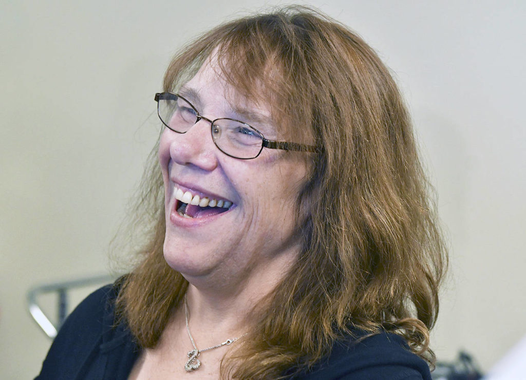 Mavis Wanczyk, of Chicopee, Massachusetts, smiles during a news conference where she claimed the $758.7 million Powerball prize at Massachusetts State Lottery headquarters on Thursday. (AP Photo/Josh Reynolds)
