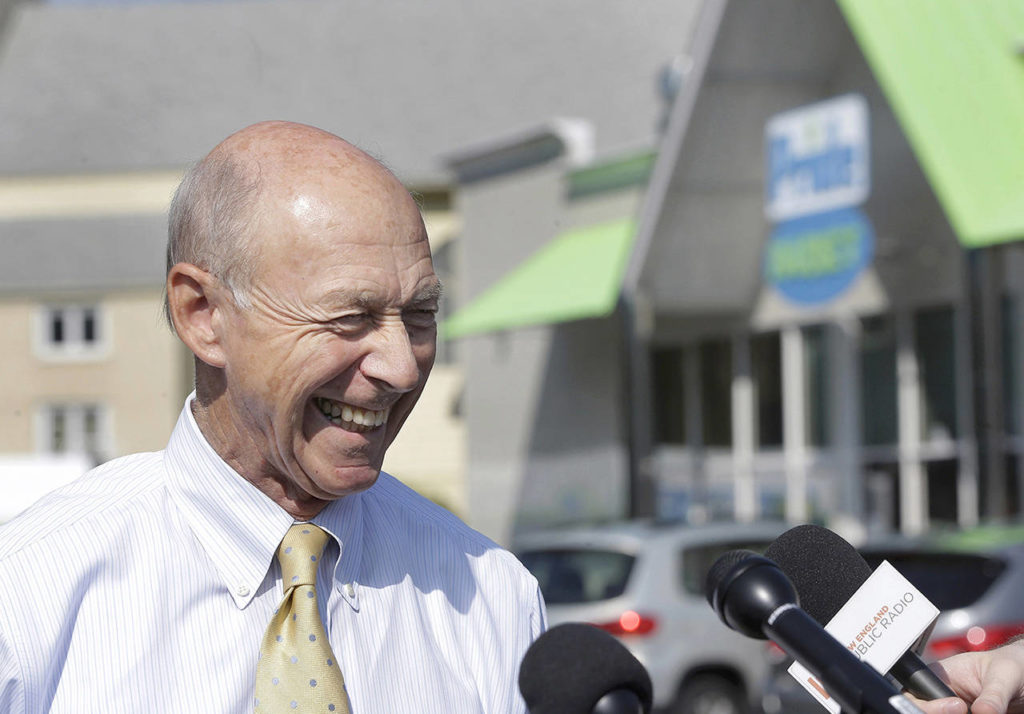 Bob Bolduc, founder and owner of Pride stores, smiles as he takes questions from members of the media during a news conference at the Pride Station & Store, on Thursday in Chicopee, Massachusetts, where the winning ticket for the Powerball was sold. (AP Photo/Steven Senne)
