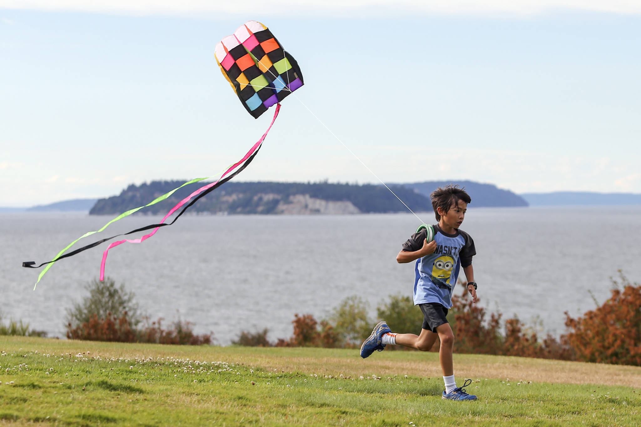 Francis Bomersheim, 9, flies a kite at Harborview Park in Everett on Aug. 23. (Kevin Clark / The Herald)