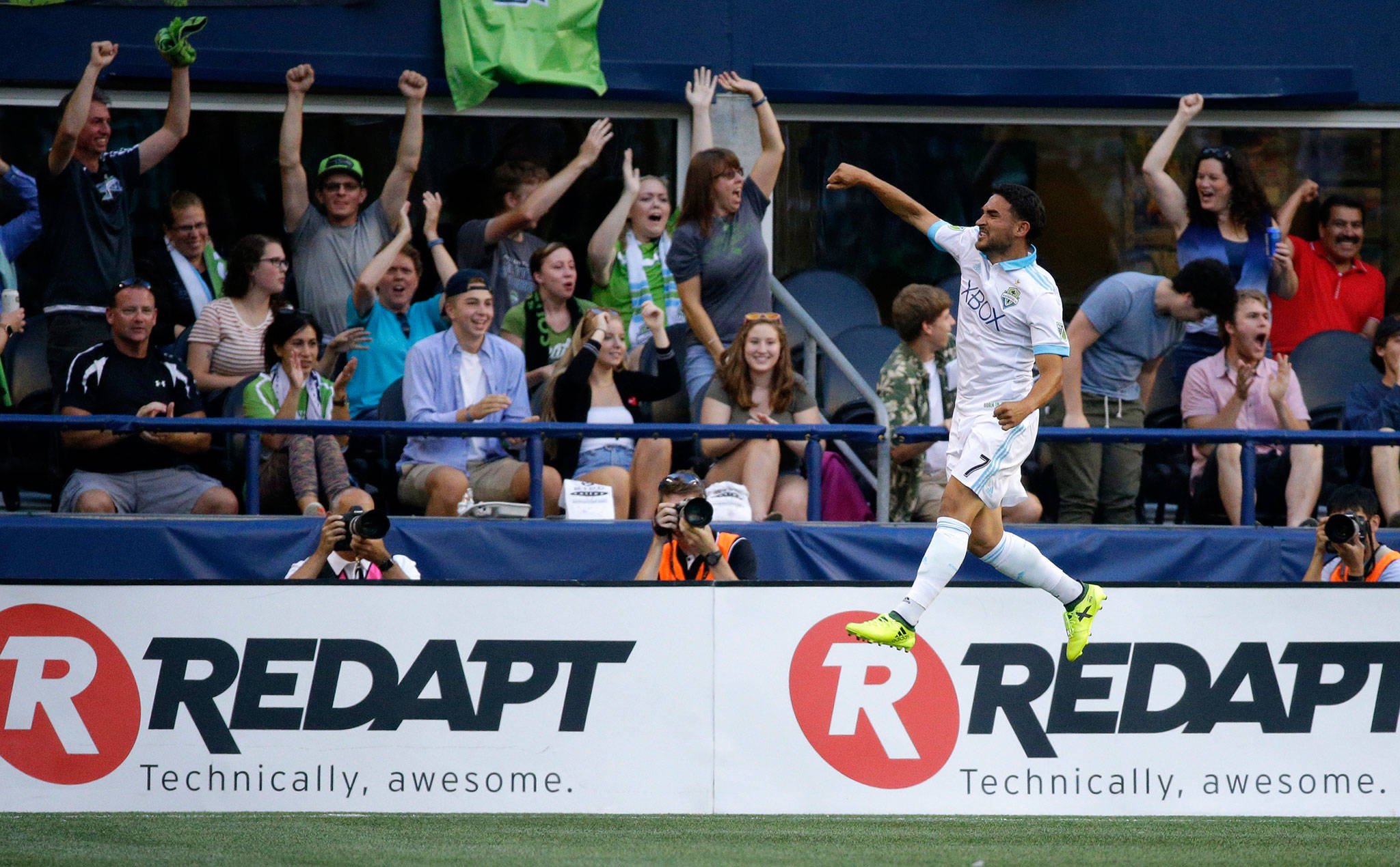 Cristian Roldan of the Seattle Sounders leaps in celebration after he scored a goal against the Portland Timbers on Sunday night in Seattle. (AP Photo/Ted S. Warren)