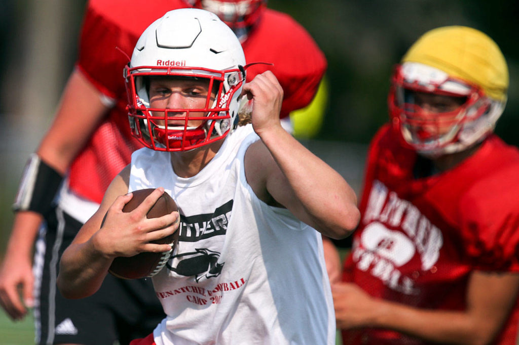 Snohomish’s Keegan Stich runs during a team practice on Monday at Snohomish High School. Stich’s vision and purposeful running style make him a threat to score any time he touches the ball for the Panthers. (Kevin Clark / The Herald)
