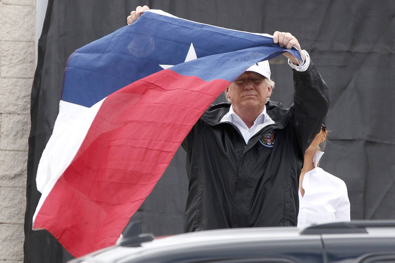 Trump offers Texans in-person reassurances on storm recovery