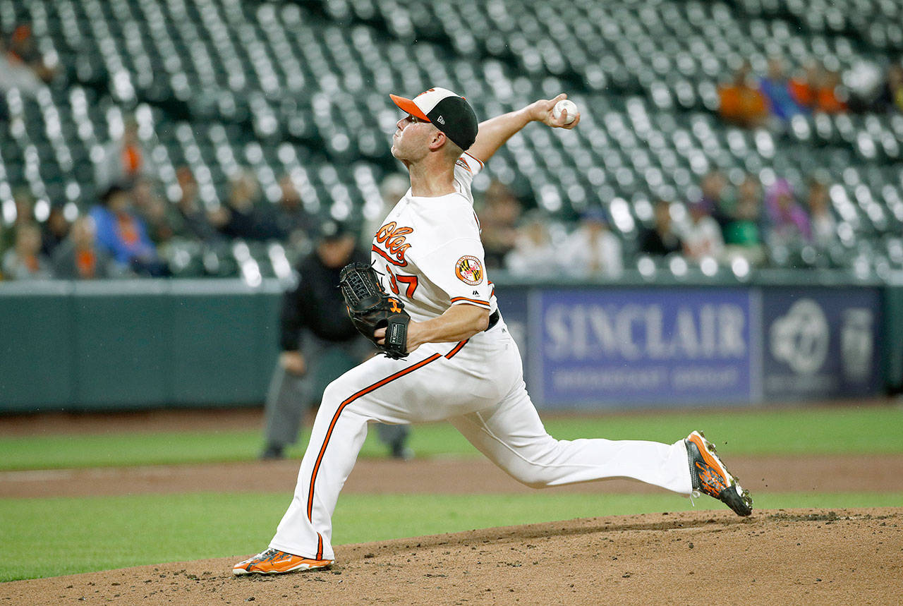 Baltimore’s Dylan Bundy throws during the second inning of the Orioles’ 4-0 shutout of Seattle on Tuesday in Baltimore. The Mariners managed just one hit off Bundy in their fifth consecutive loss. (AP Photo/Patrick Semansky)