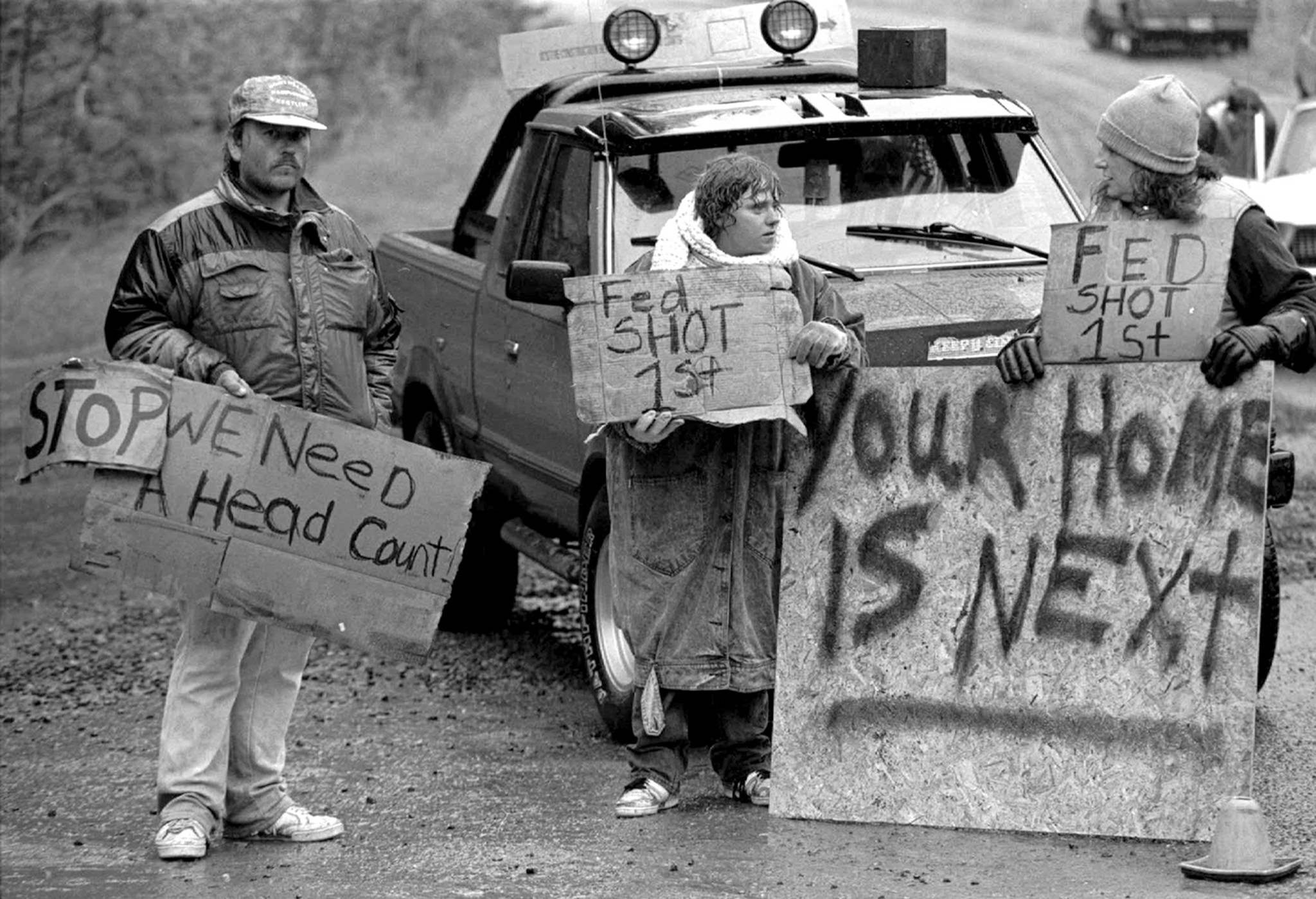 This Aug. 23, 1992 photo shows Randy Weaver supporters at Ruby Ridge in northern Idaho. (AP Photo/Jeff T. Green, File)