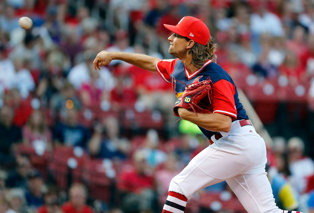 Mike Leake of the St. Louis Cardinals throws a pitch during the first inning of a game against the Tampa Bay Rays on Saturday in St. Louis. (AP Photo/Jeff Roberson)