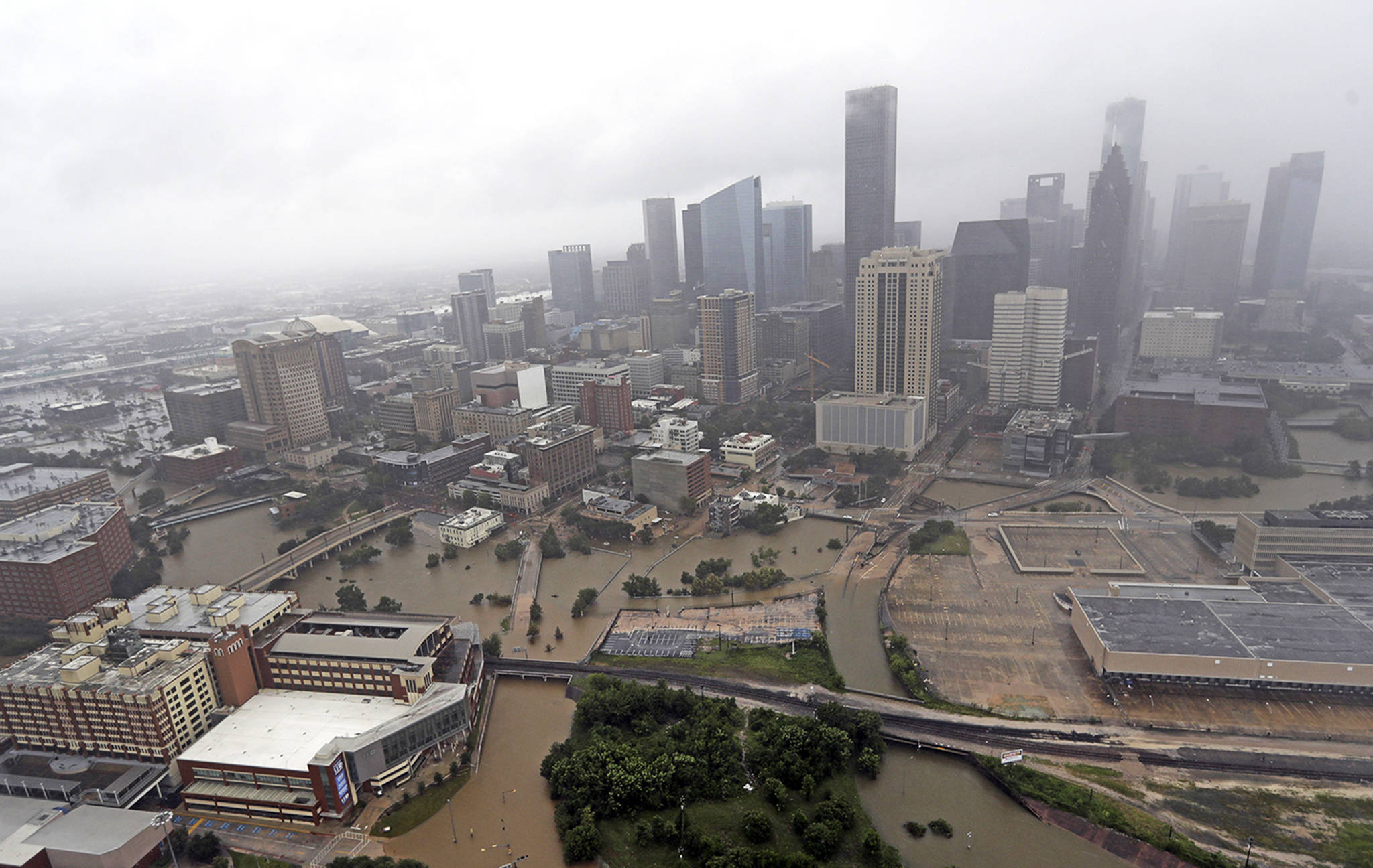 In this Aug. 29 photo, highways around downtown Houston are empty as floodwaters from Harvey overflow from the bayous around the city in Houston. (AP Photo/David J. Phillip, File)