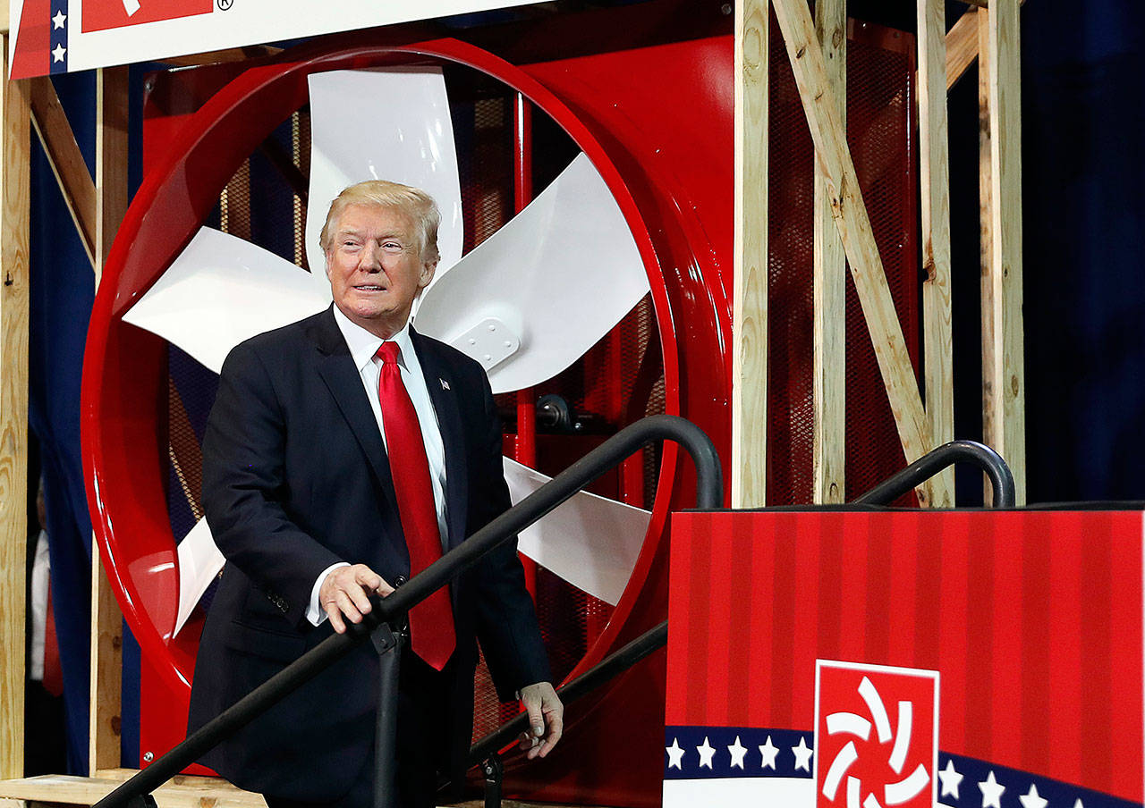 President Donald Trump arrives to speak about tax reform Wednesday at the Loren Cook Company in Springfield, Missouri. (AP Photo/Alex Brandon)