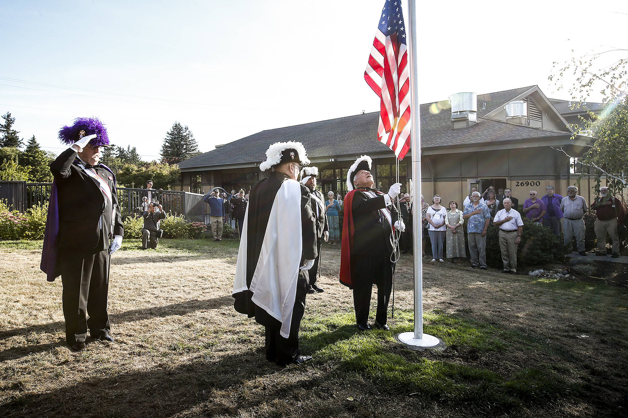 Members of the Stanwood Knights of Columbus perform a ceremony before the start of a fundraising dinner at St. Cecilia Catholic Church on Saturday. (Ian Terry / The Herald)