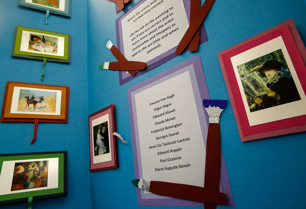 This year, Laura Elhai heads the American Heritage exhibit on the 1950s and judged baking and canning. Additionally, she has been a prolific entrant, winning numerous ribbons and a sweepstakes. She made this blue-ribbon winning display so visitors can test their knowledge of famous artists, matching their names with their paintings. (Dan Bates / The Herald)
