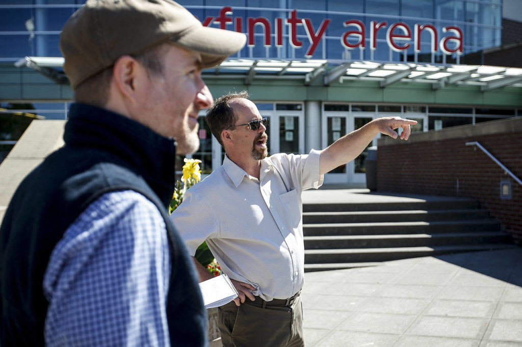 City of Everett planners Niels Tygesen (left) and David Stahlheim take a look at downtown Everett’s core. (Ian Terry / The Herald)
