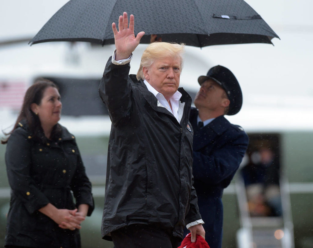 President Donald Trump and first lady Melania Trump walk towards Air Force One at Andrews Air Force Base in Md., Saturday, Sept. 2, 2017. The President is heading to Houston and Lake Charles, Louisiana to survey Harvey’s devastation. AP Photo/Susan Walsh)
