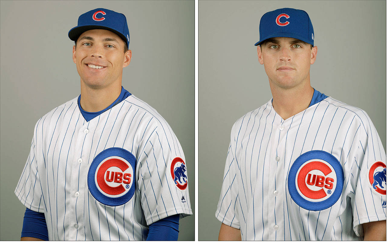 These Feb. 21, 2017 photos show Jacob Hannemann (left) and Seth Frankoff of the Chicago Cubs baseball team. (AP Photo/Morry Gash)